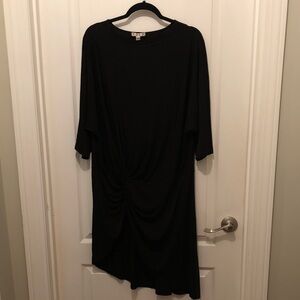 Color Story Black 3/4 Sleeve long top with front slit.